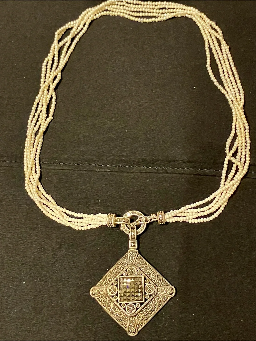 Multi-Strand Cream Pearl Necklace with Filigree Silver Pendant